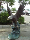 Life Size Eagle On Wave bronze