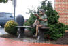 Boy Reading on Bench with Dog bronze statue