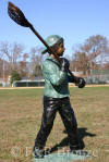 Boy Playing Lacrosse bronze statue