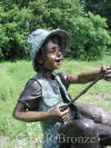 Boy Fishing From Tree with Dog bronze sculpture