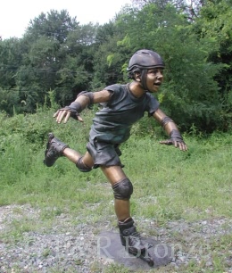 Boy Rollerblading bronze sculpture