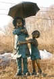 Boy & Girl with Umbrella bronze statue