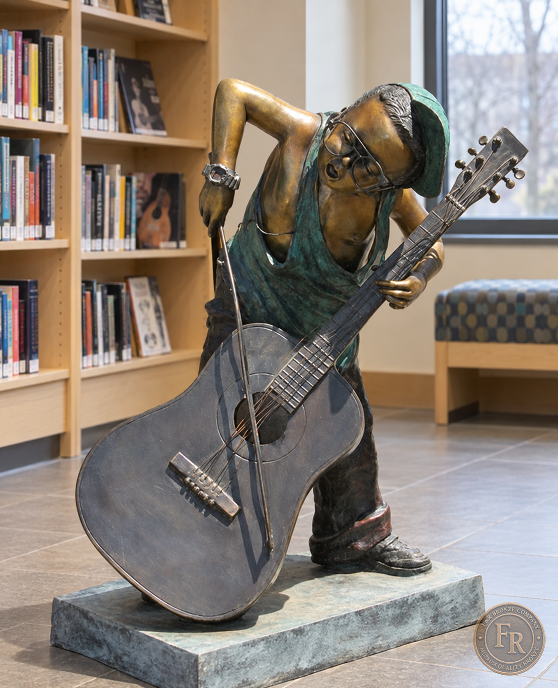 Jumbo Boy Playing Guitar Bronze Statue, item 806, front, in a modest contemporary library setting. Placement concept based on the owner-supplied product photograph.