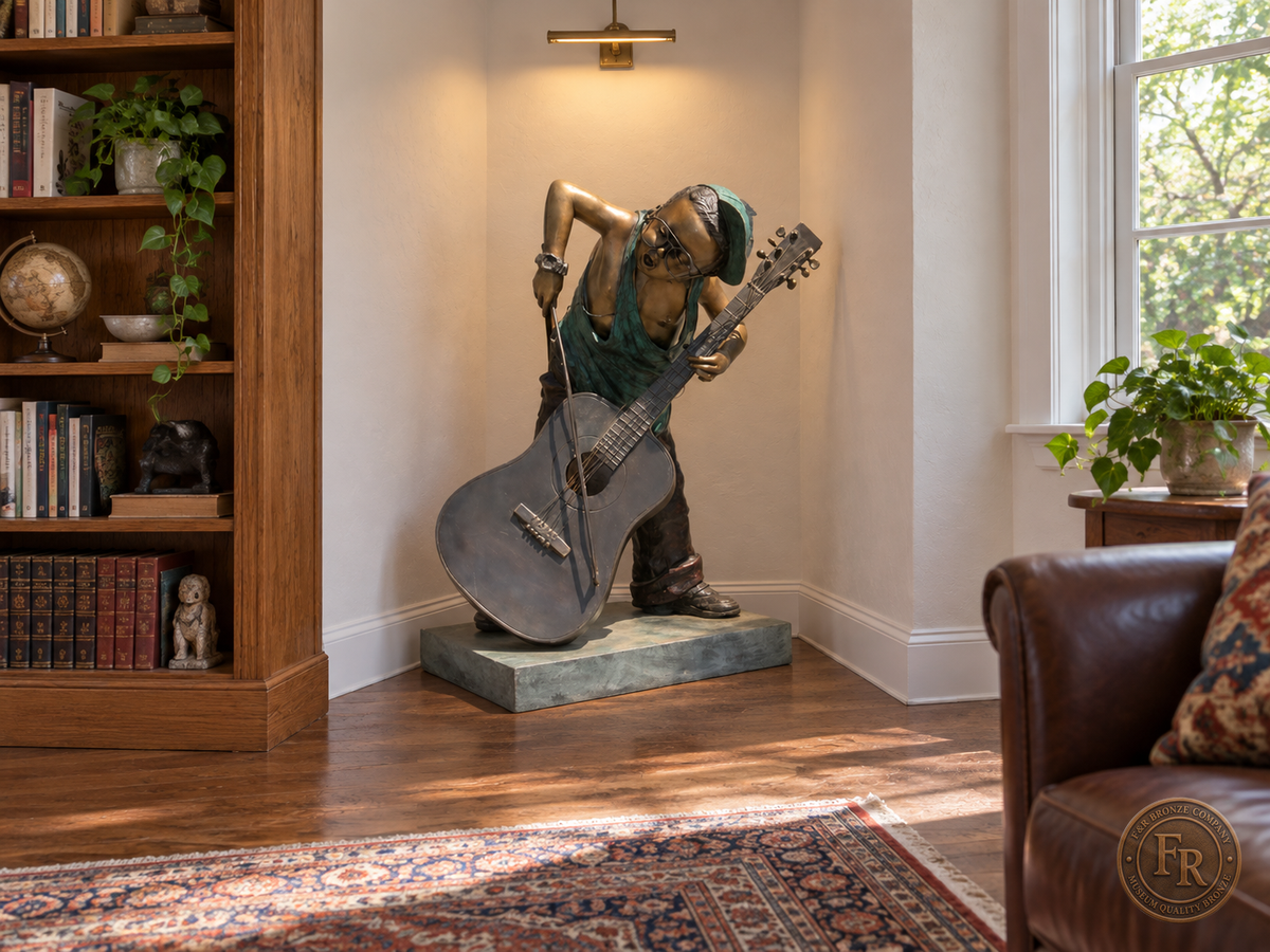 Boy musician bronze sculpture, front three-quarter view, placed in a library corner beside a bookcase with its original base and clear walking space.