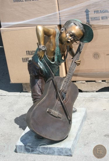 Original alternate front photograph of Jumbo Boy Playing Guitar Bronze Statue, item 806, F&R Bronze.
