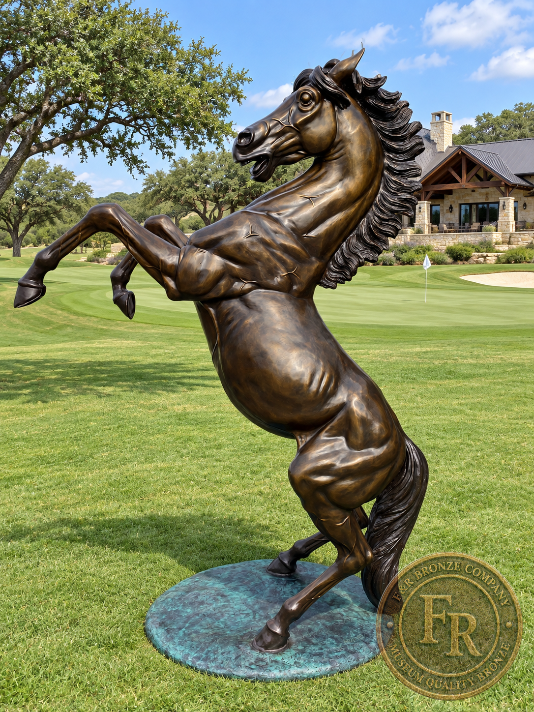 Full view of a rearing stallion bronze sculpture in a ranch landscape architectural concept.