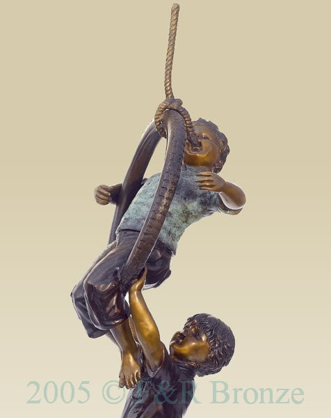 Monumental Boys On Tire Swing Bronze Statue
