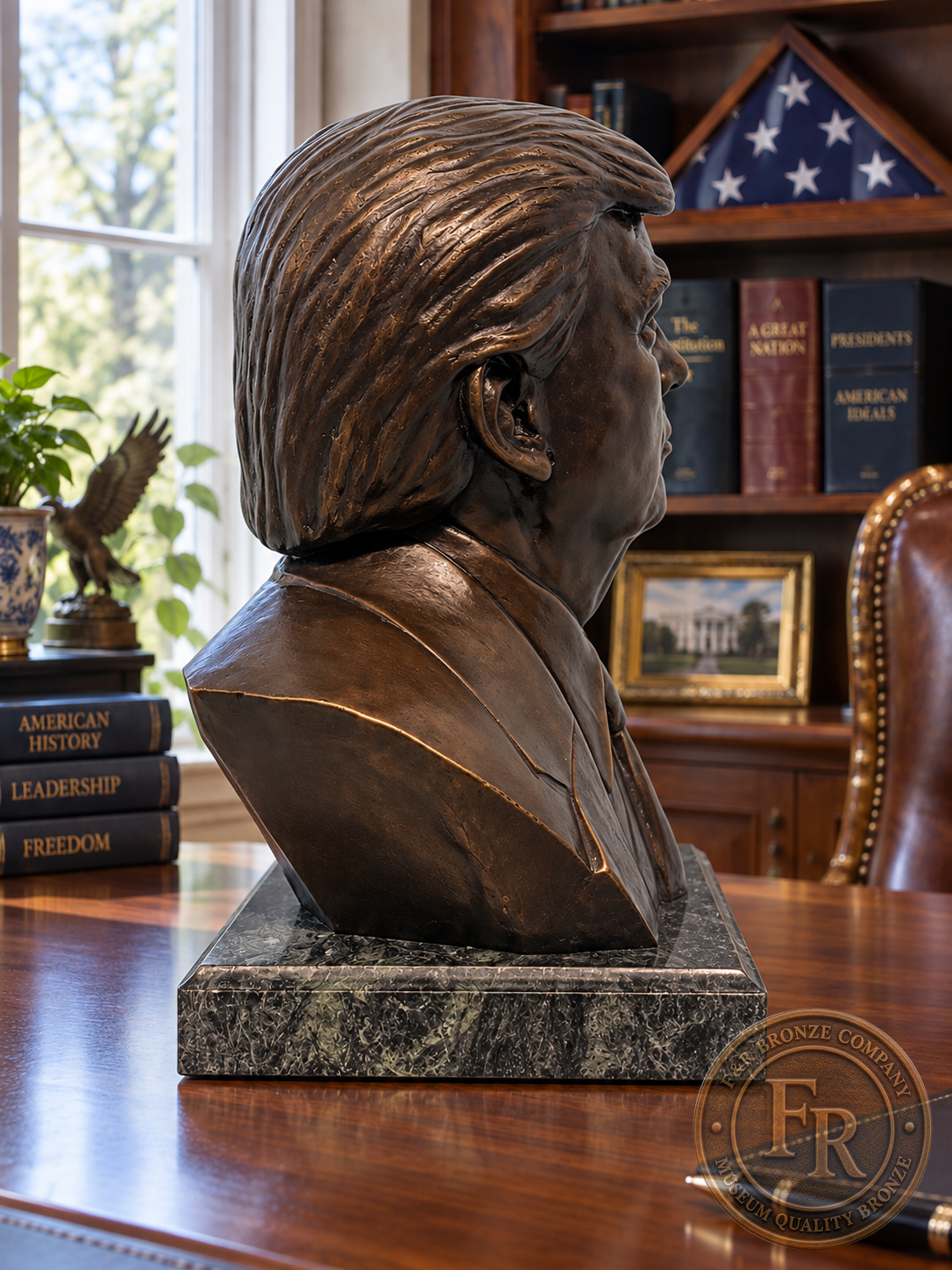 Right-facing profile of a President Donald J. Trump bronze portrait statue, showing the modeled hair, suit and stone base.