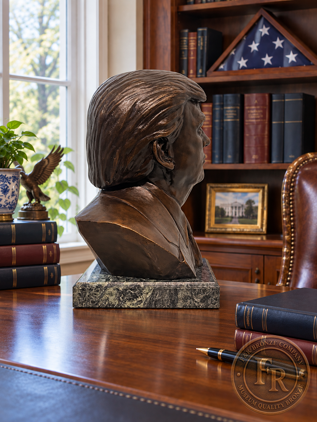 Wide right-profile view of a President Donald J. Trump bronze sculpture, with its stone base and surrounding office setting.