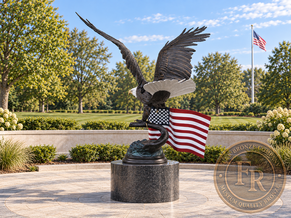Rear three-quarter view of the patriotic bronze eagle sculpture on a round pedestal in a veterans memorial concept.