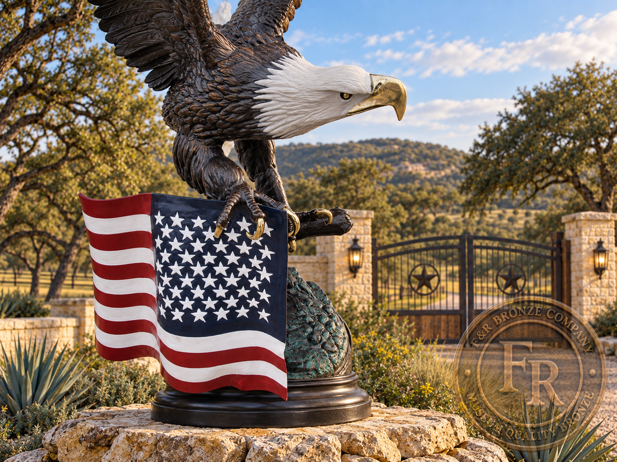 Detail of the bronze eagle’s white head, beak, talons and painted stars and stripes in a Texas ranch architectural concept.