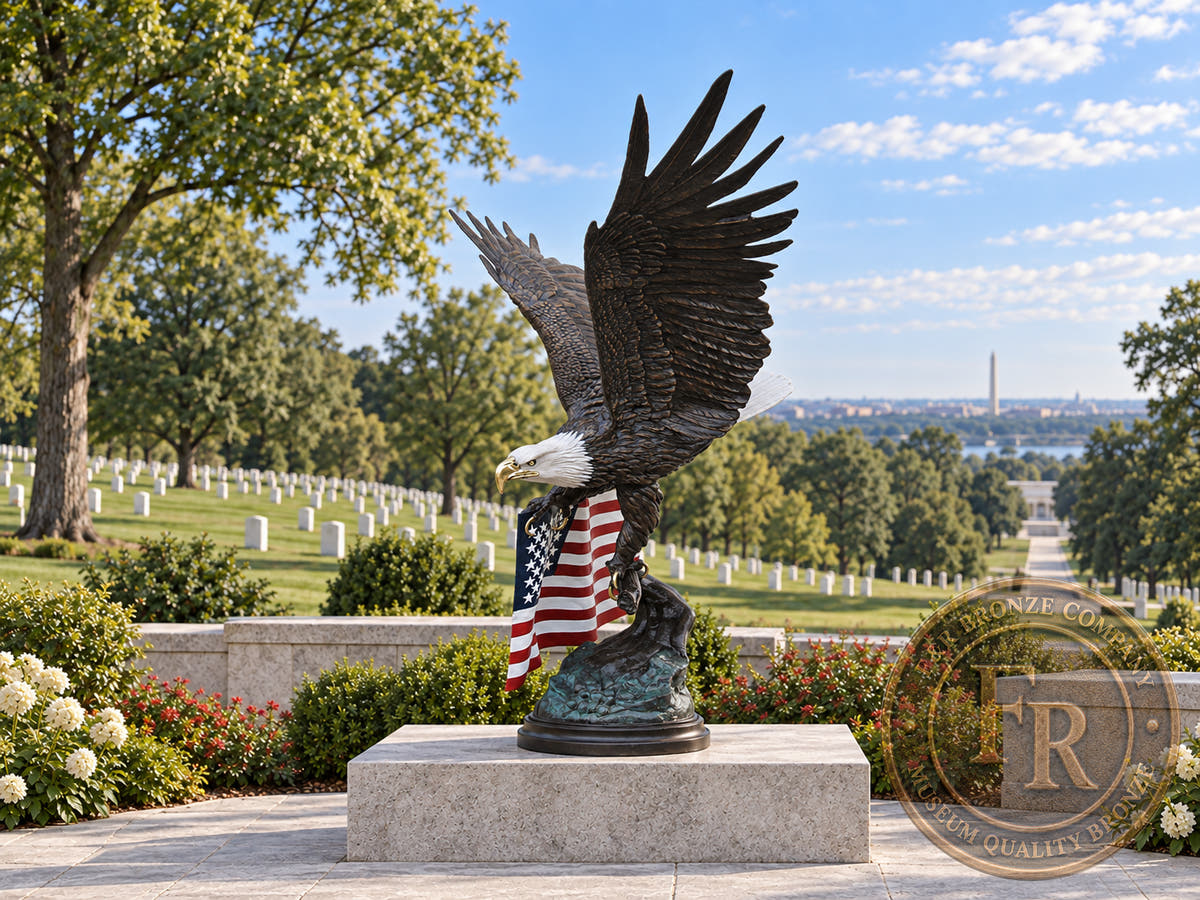 Side view of the monumental bronze eagle with American flag in a cemetery memorial architectural concept.