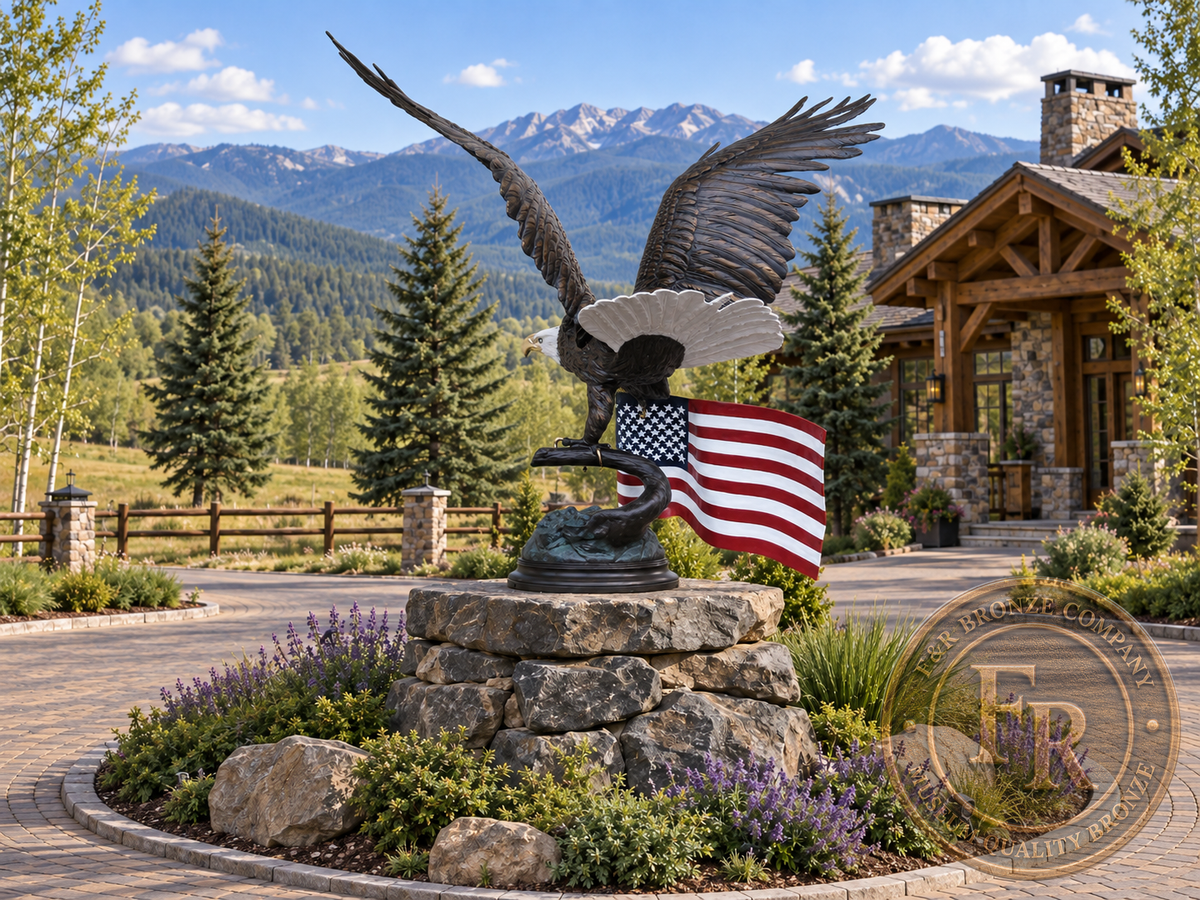 Rear three-quarter architectural concept of the eagle bronze statue with American flag overlooking a mountain ranch roundabout.
