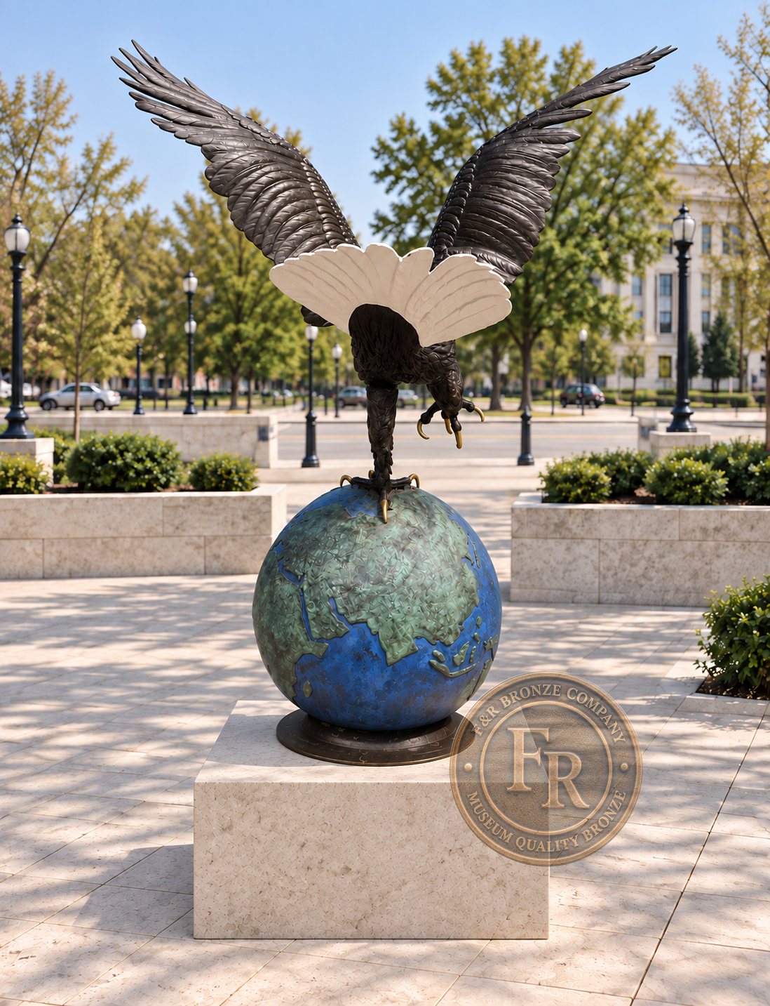 Architectural concept: rear view of the eagle on globe bronze sculpture, showing spread wings and a white tail in a civic courtyard.
