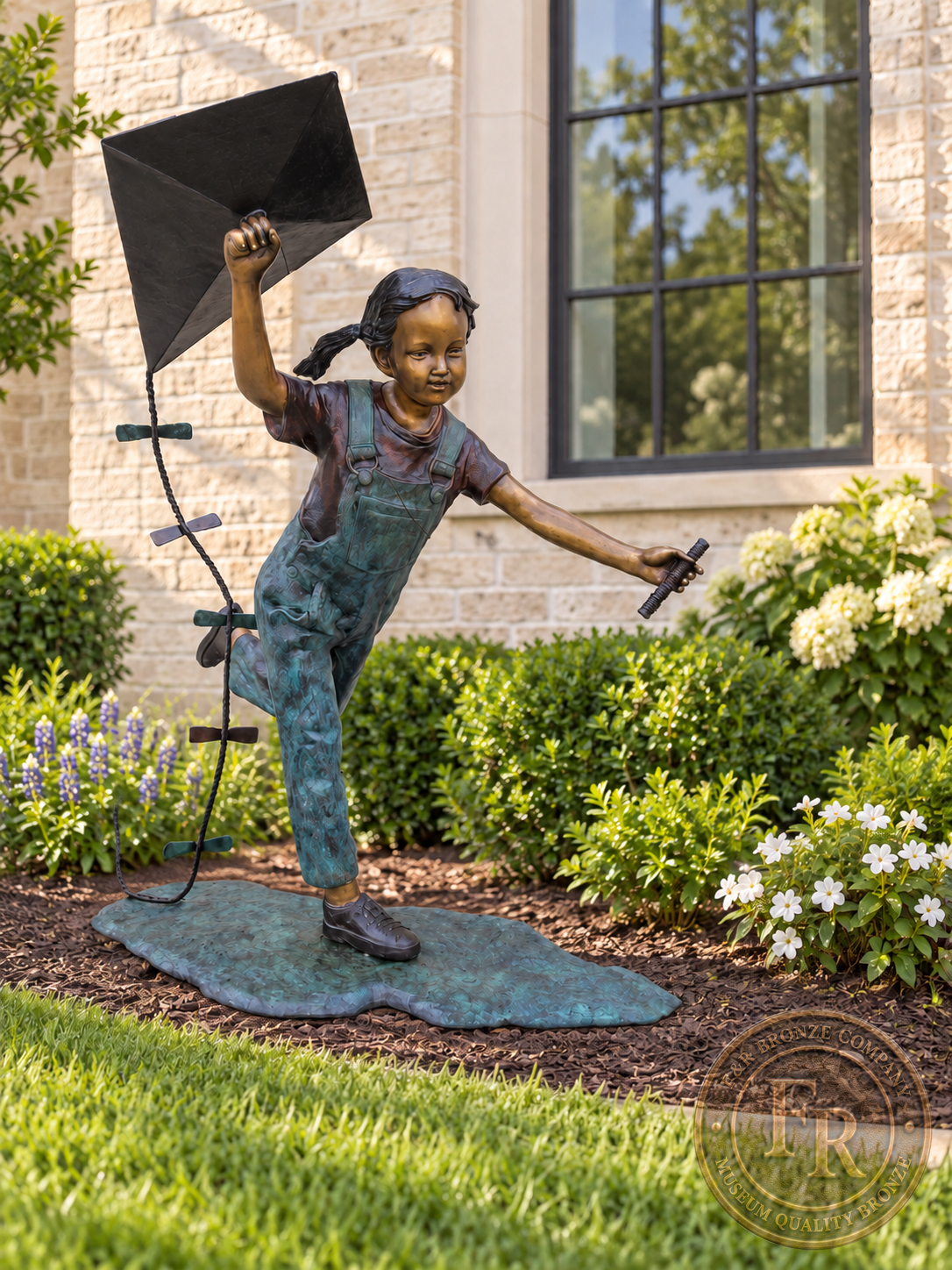 Front architectural concept of the children’s bronze statue, with the girl and raised kite above a flat garden base.