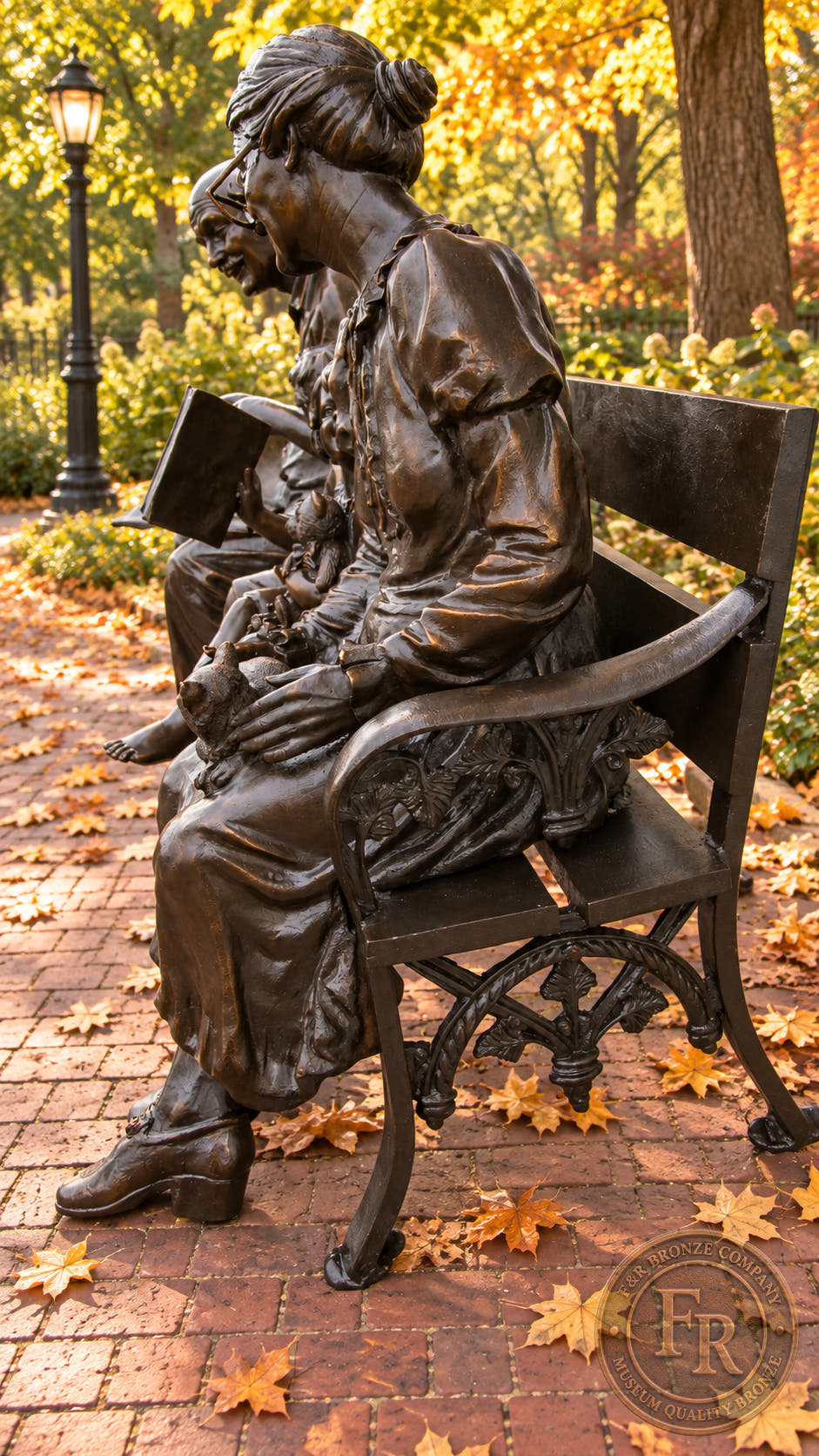 Grandmother side view of the grandparents and children bronze statue, with the decorative bench in an autumn park concept.