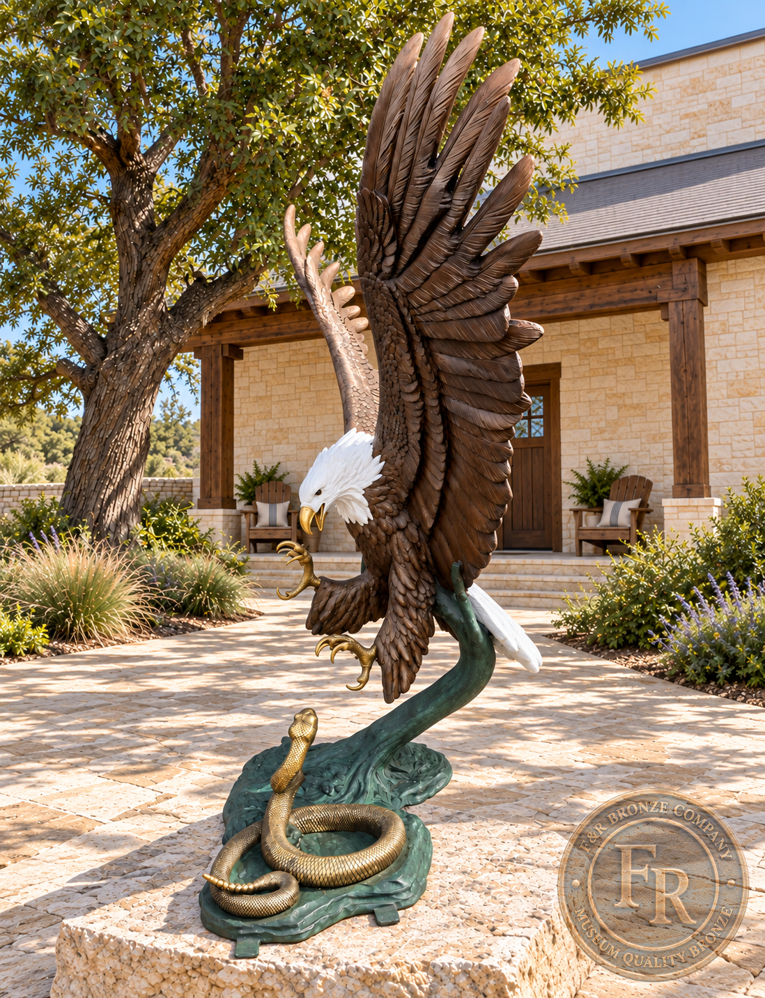 Left-side view of a bronze eagle confronting a rattlesnake, with raised wings and extended talons in a stone courtyard.