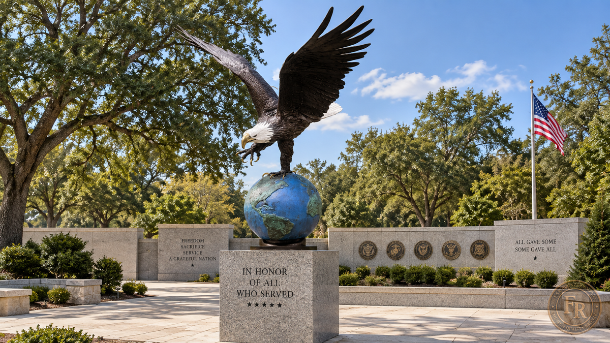 Architectural concept: eagle on globe bronze statue above a veterans memorial pedestal honoring military service.