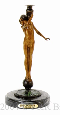 Male Candlestick bronze statue by McCartan
