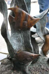 Lady with Dolphin Jumping Overhead bronze statue
