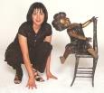 Girl on Chair bronze sculpture