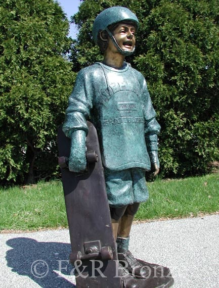 Boy with Skateboarding bronze statue-3