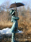 Girl holding Umbrella bronze sculpture
