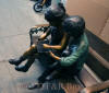 Children on Bench Reading bronze sculpture by Max Turner