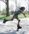 Girl Rollerblading bronze statue