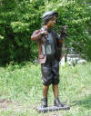 Caddy boy with Lantern bronze statue