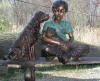 Girl with Two Dogs on Bench bronze
