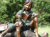 Boy & Girl Reading On Tree Branch bronze statue