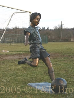 Boy Playing Soccer bronze