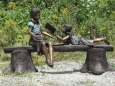Two Girls Reading On Bench bronze