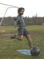 Boy Playing Soccer bronze